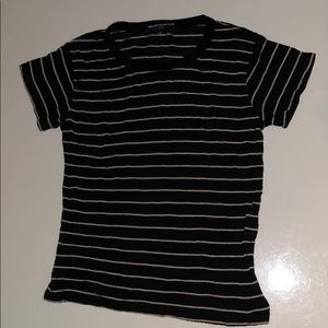 Black and white striped t-shirt.